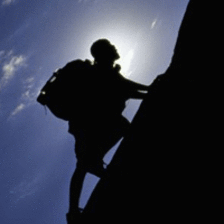 Man climbing rock wall